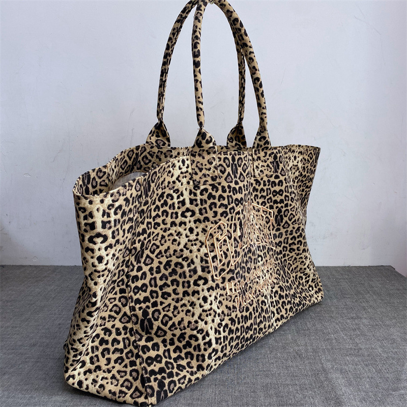 Bolso de mano unisex con estam - Embroidery Motif reseña y precio